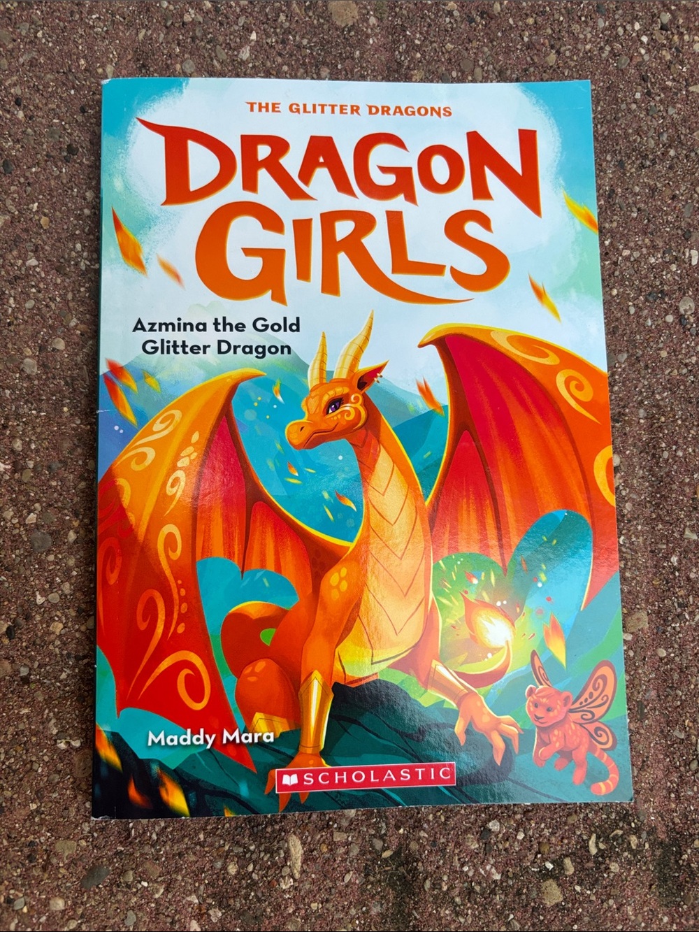Scholastic Dragon Girls: Azmina the Gold Glitter Dragon - Orange and Blue Cover